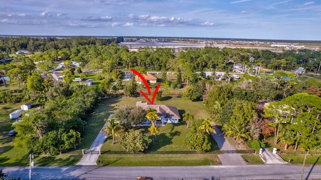 12855 87th St N, West Palm Beach, FL 33412 - view of property location with a tree filled landscape