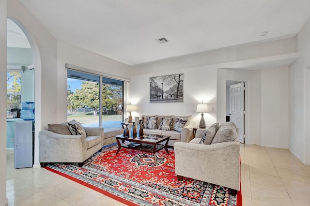 12855 87th St N, West Palm Beach, FL 33412 - living room with arched walkways and light tile patterned floors