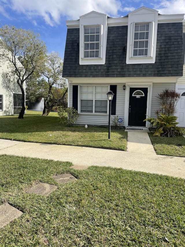 view of front of property with a front yard