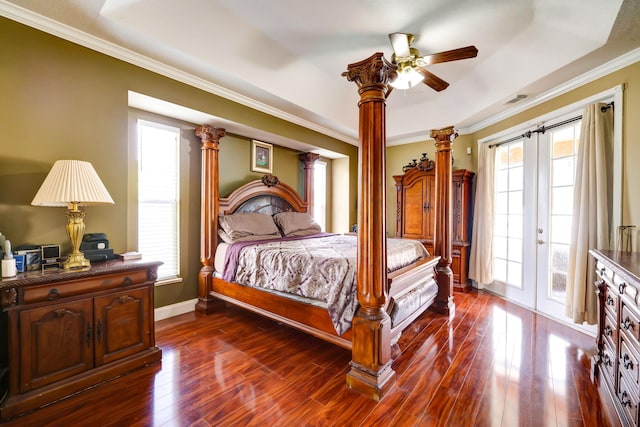 bedroom with dark wood-type flooring, crown molding, decorative columns, and access to exterior