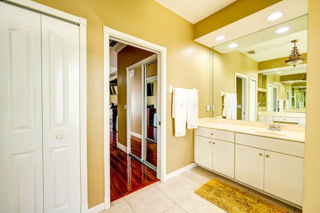 bathroom with vanity and tile patterned floors