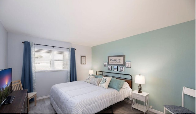 bedroom featuring hardwood / wood-style floors