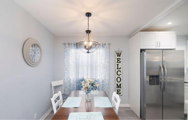 unfurnished dining area with dark hardwood / wood-style floors and a chandelier