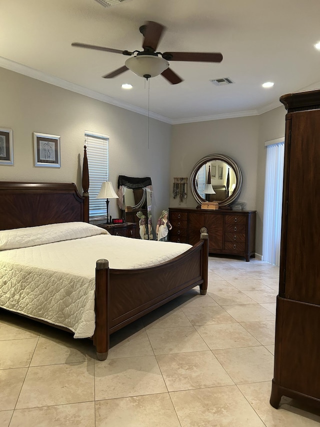 bedroom with ceiling fan, ornamental molding, and light tile patterned flooring