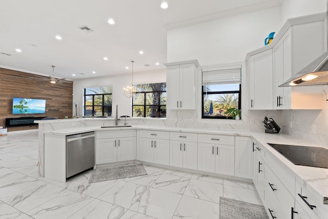 kitchen with pendant lighting, sink, stainless steel dishwasher, kitchen peninsula, and black electric cooktop