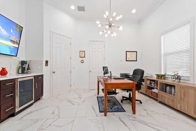 home office featuring wine cooler, crown molding, an inviting chandelier, and a high ceiling