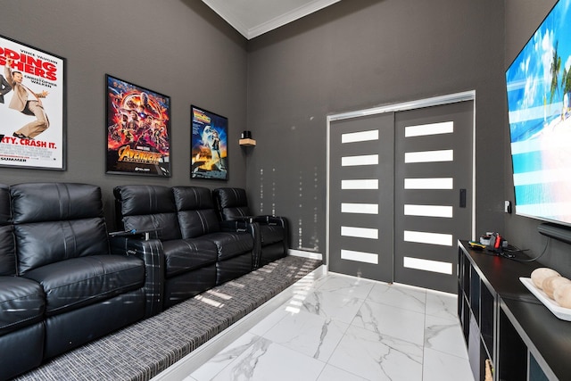 cinema room featuring french doors and ornamental molding