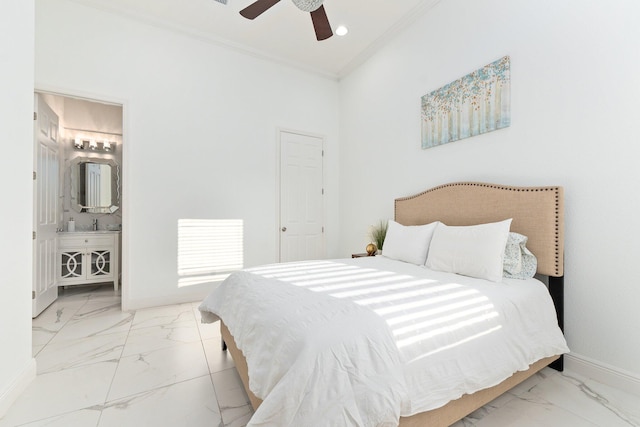 bedroom with crown molding, ceiling fan, and ensuite bathroom