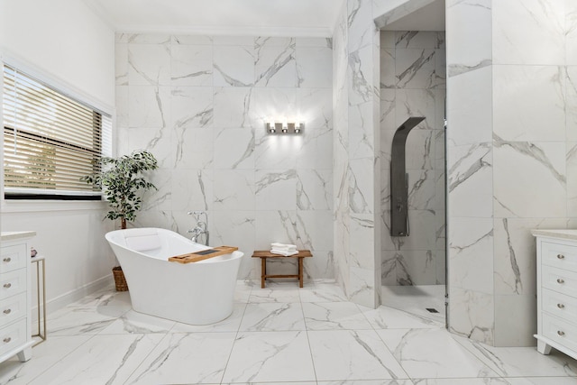 bathroom with vanity, crown molding, and separate shower and tub