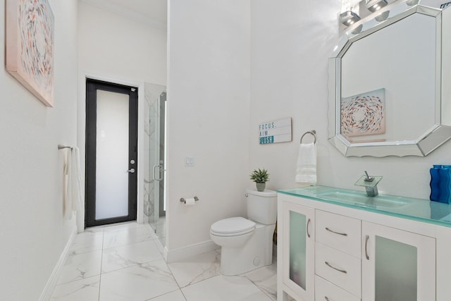 bathroom featuring vanity, an enclosed shower, crown molding, and toilet