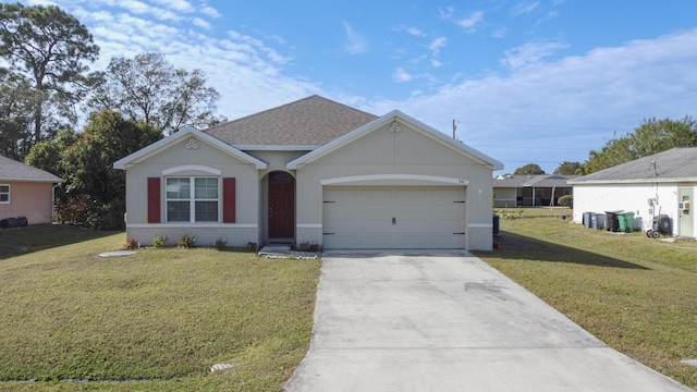 single story home with a front lawn and a garage