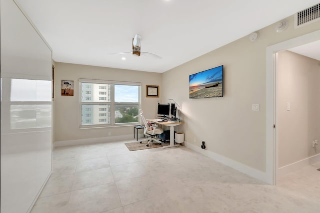 office space with ceiling fan