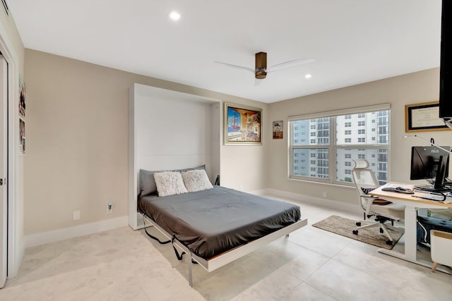 tiled bedroom featuring ceiling fan