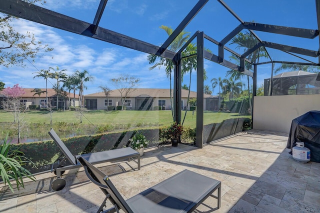 view of patio with a lanai and a residential view