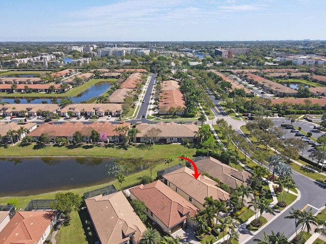 aerial view with a residential view and a water view