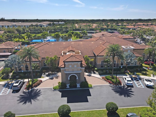 bird's eye view with a residential view and a water view