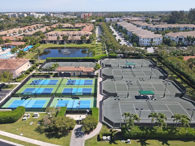 bird's eye view with a residential view and a water view