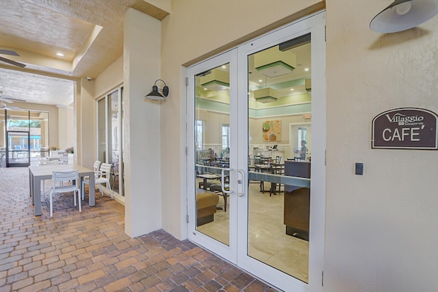 interior space with a patio area and french doors