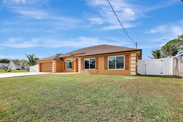 ranch-style home with a front yard and a garage