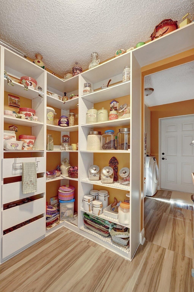 pantry featuring washer / dryer