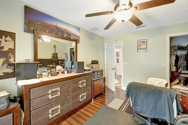 office space featuring dark hardwood / wood-style flooring and a textured ceiling