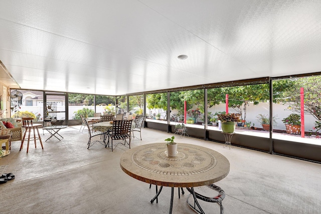 sunroom with plenty of natural light