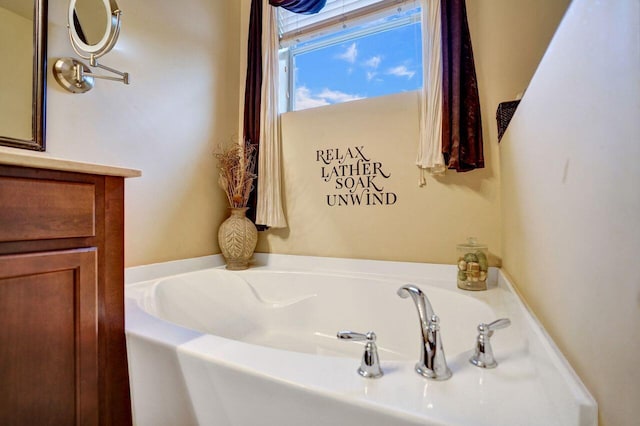 bathroom featuring a bath