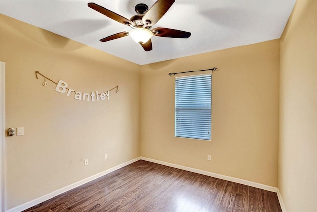 empty room featuring ceiling fan and hardwood / wood-style floors