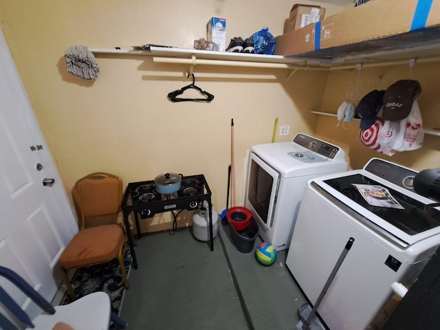 washroom with independent washer and dryer