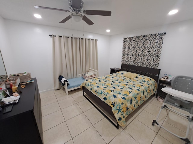 bedroom featuring ceiling fan and light tile patterned flooring