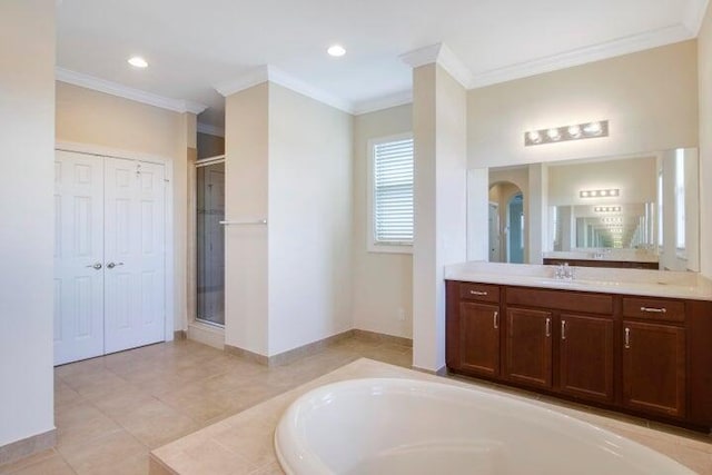 bathroom featuring independent shower and bath, tile patterned flooring, vanity, and ornamental molding