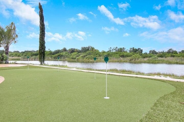 surrounding community featuring a water view