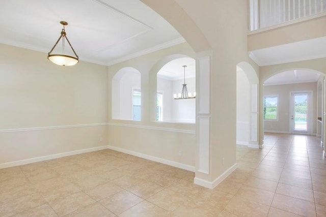 tiled empty room with crown molding