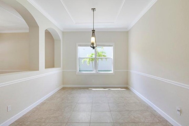 unfurnished dining area with light tile patterned floors and crown molding