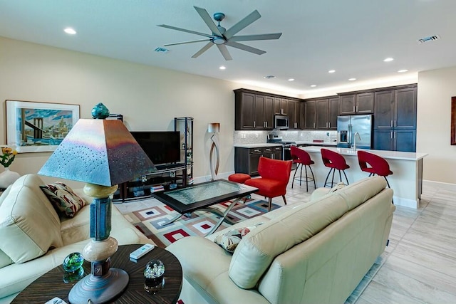 living room featuring sink