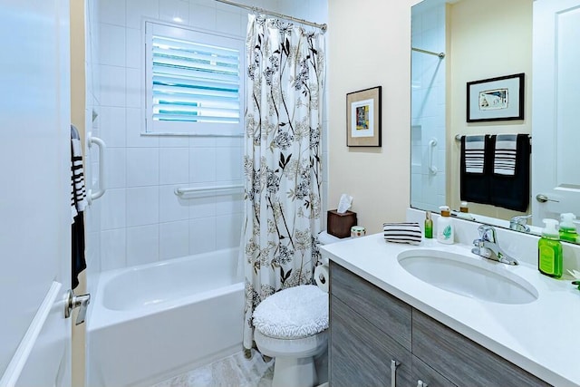 full bathroom featuring toilet, shower / tub combo, and vanity