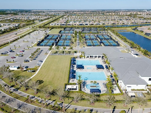 drone / aerial view with a water view