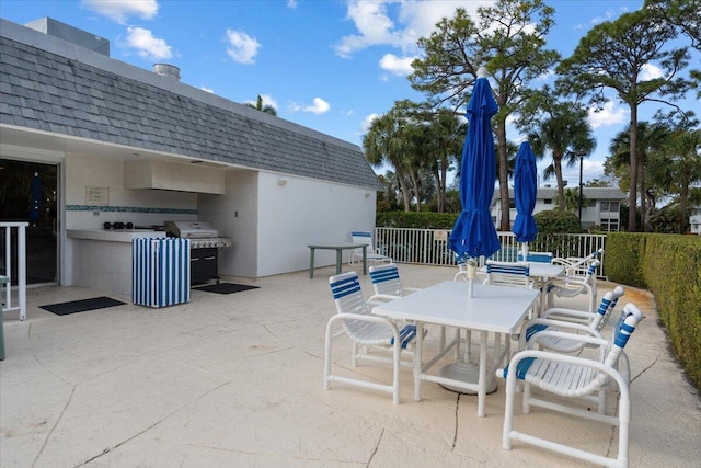 view of patio / terrace featuring an outdoor bar