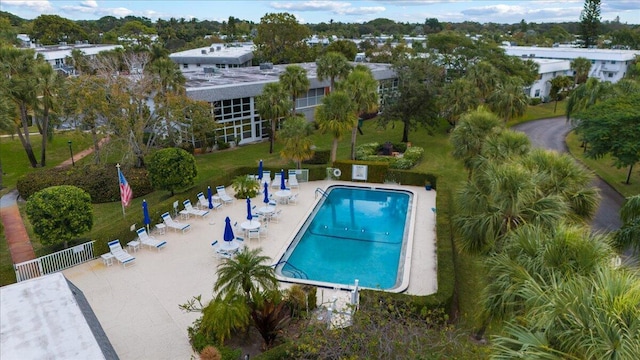 view of swimming pool with a patio area