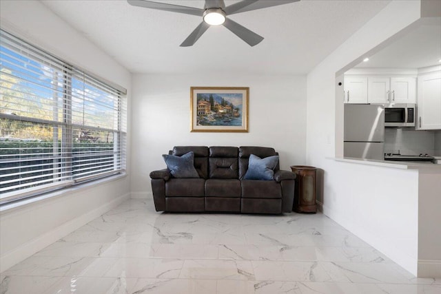 living room with ceiling fan