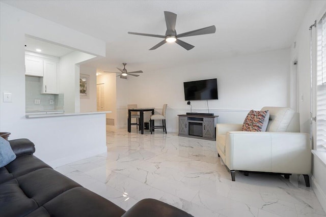 living room featuring ceiling fan