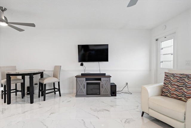 living room with ceiling fan