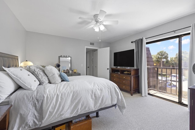 carpeted bedroom with ceiling fan and access to exterior