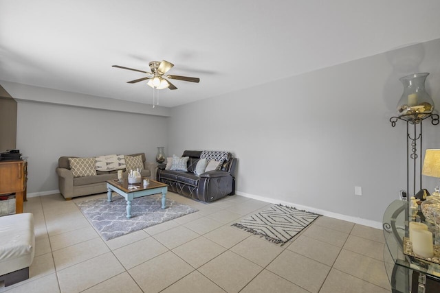 tiled living room featuring ceiling fan