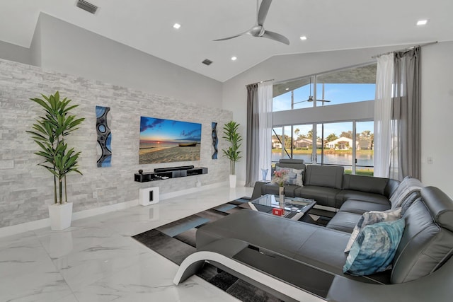 living room with high vaulted ceiling and ceiling fan