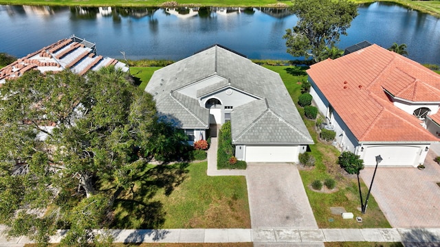 birds eye view of property featuring a water view