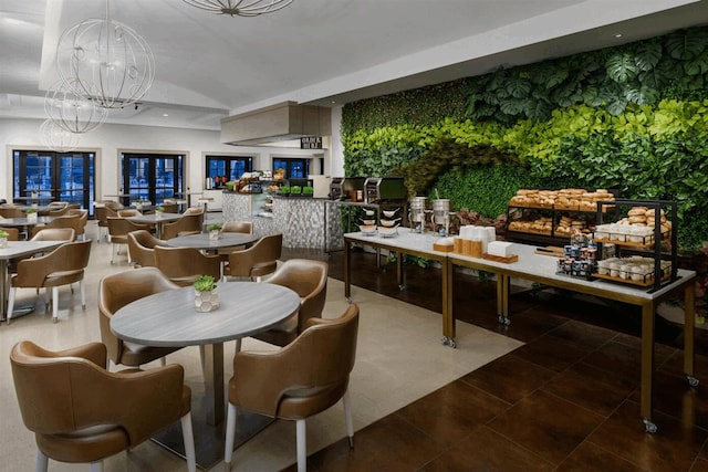 dining area featuring an inviting chandelier