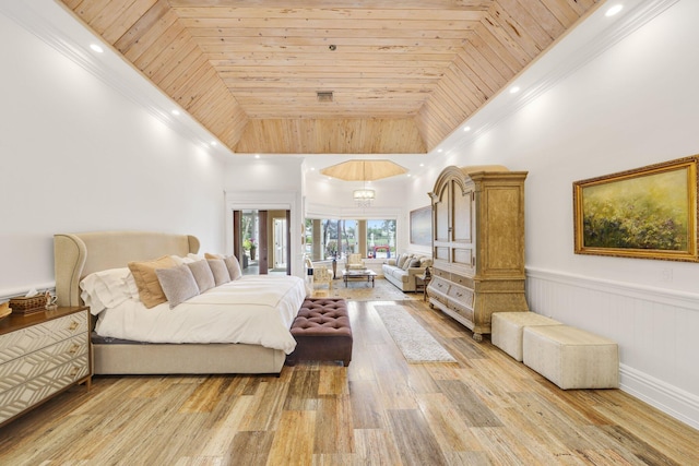 bedroom with light wood-type flooring, wood ceiling, and a tray ceiling