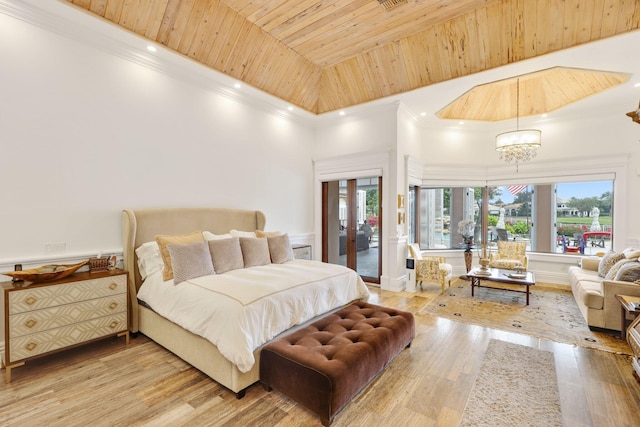 bedroom featuring wood ceiling, an inviting chandelier, access to exterior, light hardwood / wood-style floors, and a high ceiling