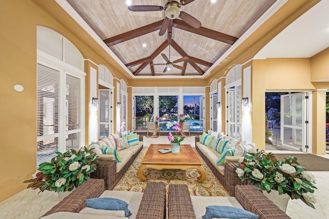 sunroom / solarium featuring vaulted ceiling with beams, wood ceiling, and ceiling fan